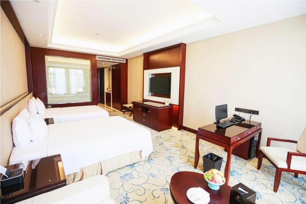 Linyi Blue Horizon International Hotel Yi He Екстериор снимка