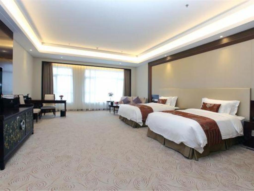 Linyi Blue Horizon International Hotel Yi He Екстериор снимка