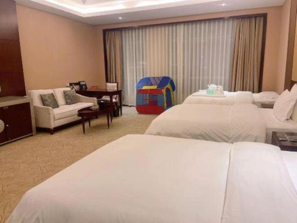 Linyi Blue Horizon International Hotel Yi He Екстериор снимка