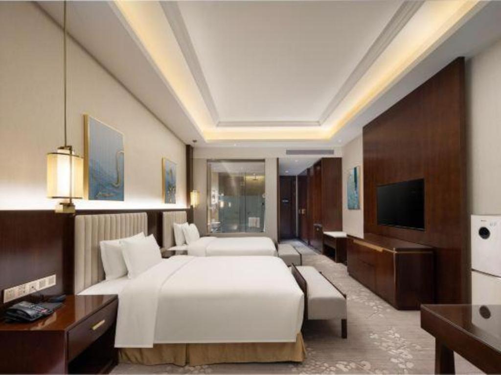 Linyi Blue Horizon International Hotel Yi He Екстериор снимка